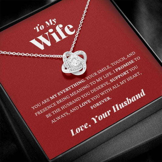 Alt text: "Personalized Wife Necklace: Heart-shaped pendant with cubic zirconia on a red box"