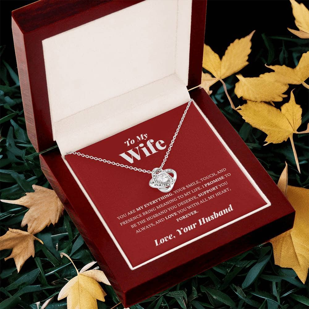 Alt text: "Personalized Wife Necklace: Heart-shaped pendant with cubic zirconia, symbolizing endless love and gratitude. Encased in a luxurious box."