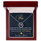 Alt text: "Personalized Wife Necklace: a heart-shaped pendant on an adjustable chain, housed in a mahogany-style box with LED lighting."