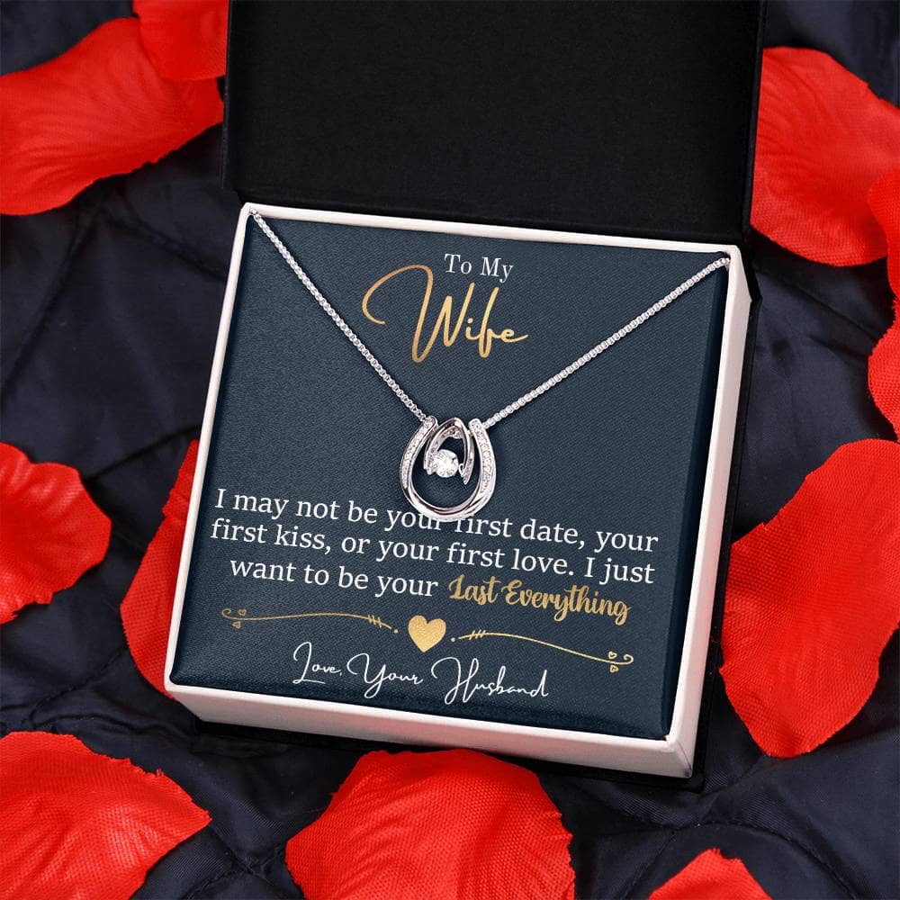 Alt text: "Personalized Wife Necklace: Heart-shaped pendant in a box on a blanket"