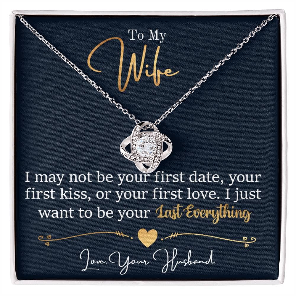 Alt text: "Personalized Wife Necklace: Love Knot Charm in a box, featuring a heart-shaped pendant with cubic zirconia. Adaptable chain options. A symbol of infinite love and elegance. Perfect for gifting."