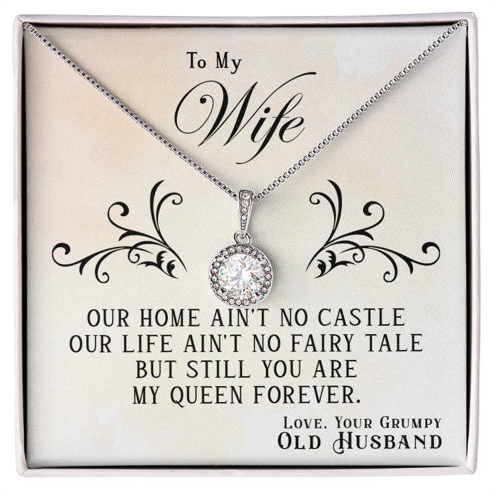 Alt text: "Personalized Wife Necklace - Queen's Embrace: A stunning stainless steel necklace with a 14k white gold finish. Features a cushion-cut cubic zirconia centerpiece surrounded by shimmering stones. Adjustable box chain and secure lobster clasp. Arrives in an exquisite gift box."