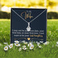 Alt text: "Personalized Wife Necklace: A ribbon-shaped pendant with a 7mm cubic zirconia on an adjustable chain. Delicately presented in a soft touch box."