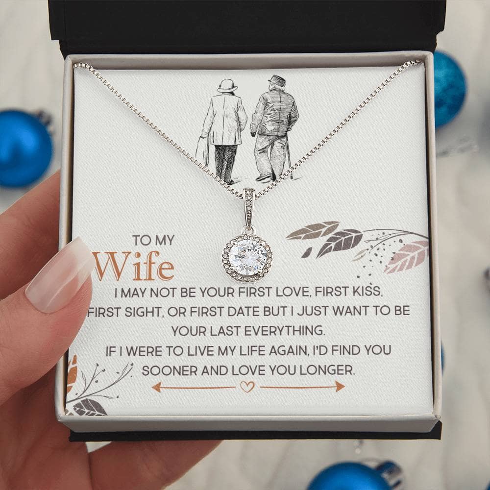 Alt text: "A hand holding a Personalized Wife Necklace with Cushion-Cut Zirconia, symbolizing everlasting love and devotion."