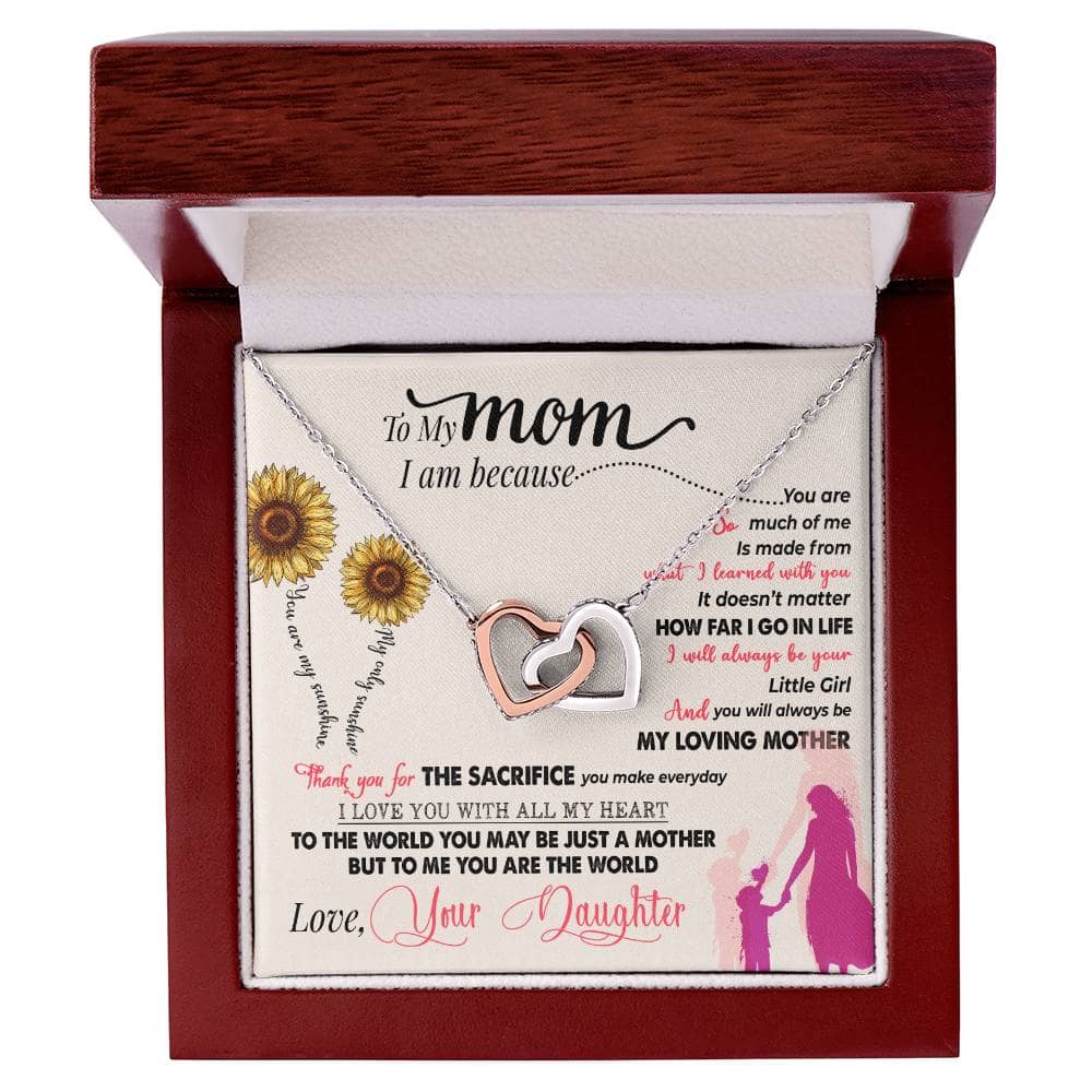 Alt text: "Premium Personalized Mother Necklace in a box, symbolizing unconditional love and adorned with a cushion-cut cubic zirconia. Adjustable cable and box chain included. Luxury packaging with LED lighting."