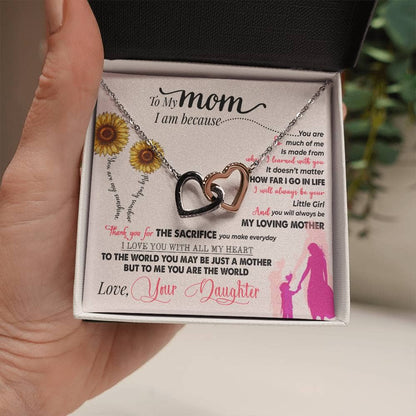 Alt text: Premium Personalized Mother Necklace - Hand holding necklace in a box, symbolizing unconditional love and elegance.