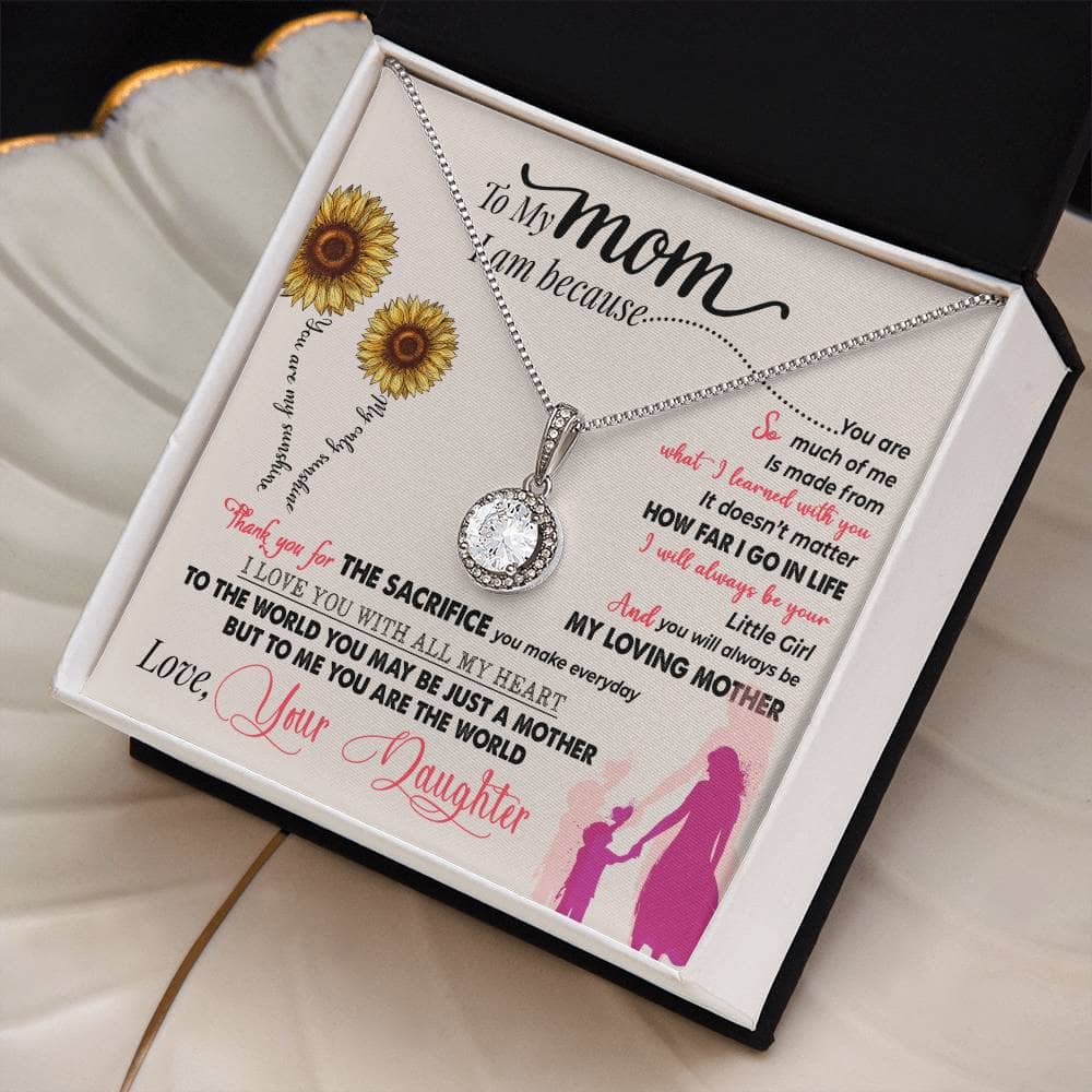 Alt text: "Premium Personalized Mother Necklace in a box, featuring a heart-shaped pendant with a diamond close-up detail."