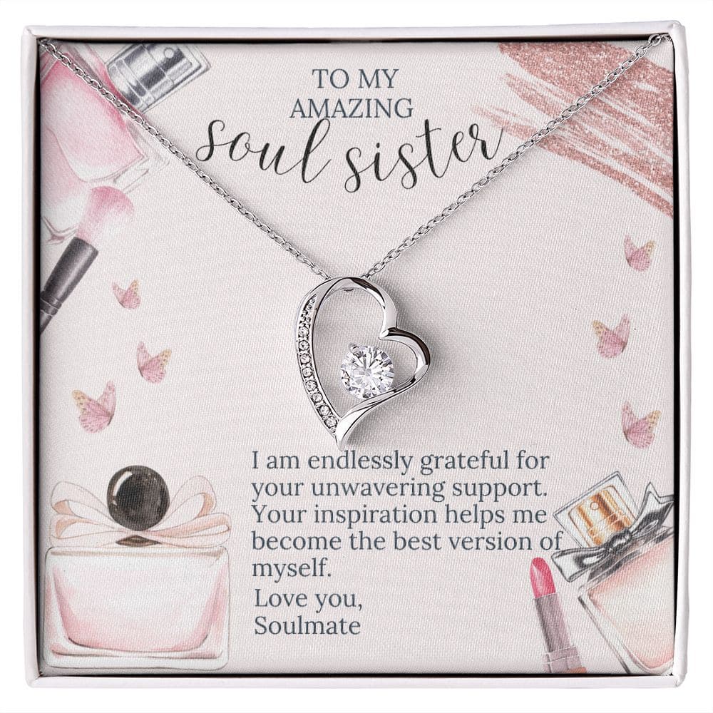 Alt text: "Soul Sister Unity Necklace Set - a necklace in a box with a diamond heart pendant, symbolizing love and elegance."
