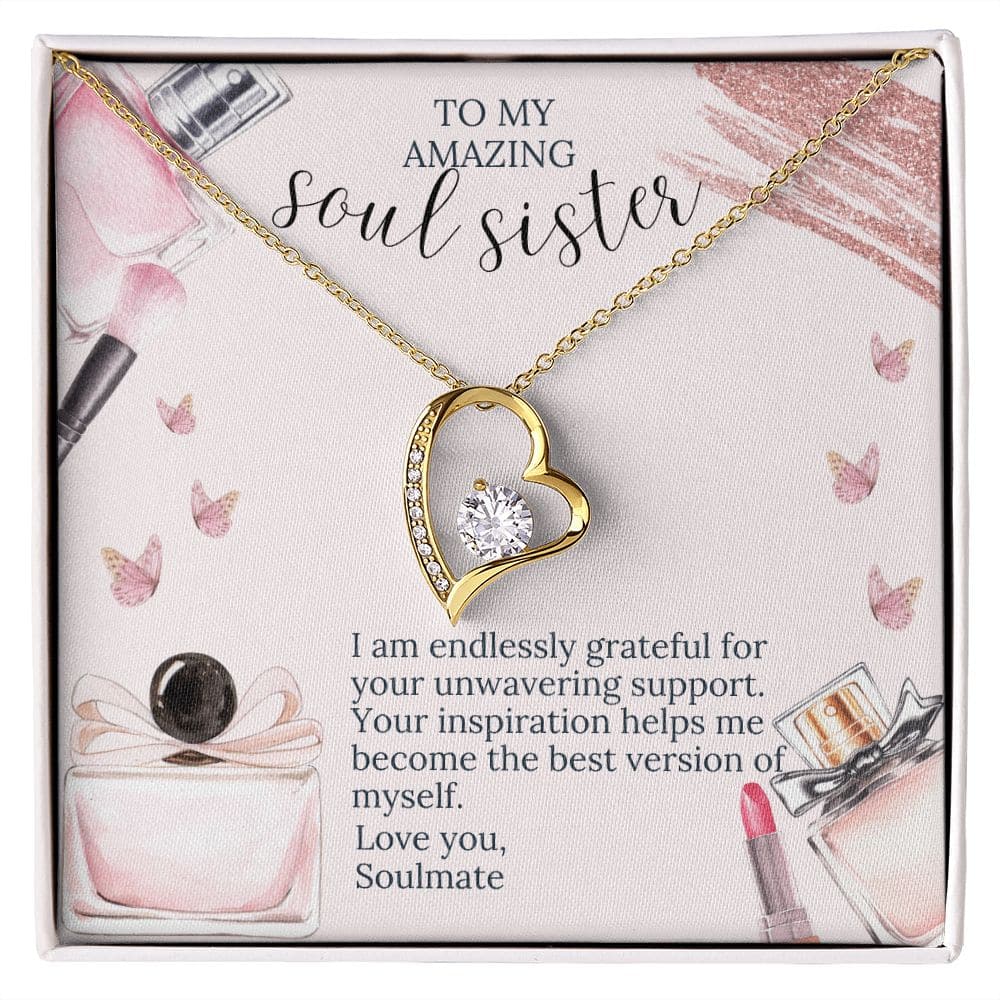A gold heart necklace in a box, adorned with a diamond and shimmering crystals. A symbol of love and elegance, this Soul Sister Unity Necklace Set is a timeless piece crafted with 14k white gold or 18k yellow gold finish. Personalize it to embody eternal love. Pendant dimensions: 0.8" height / 0.7" width. Adjustable chain length: 18" - 22". Secure wear with a sturdy lobster clasp. Ideal for gifting, it comes in a soft touch box.