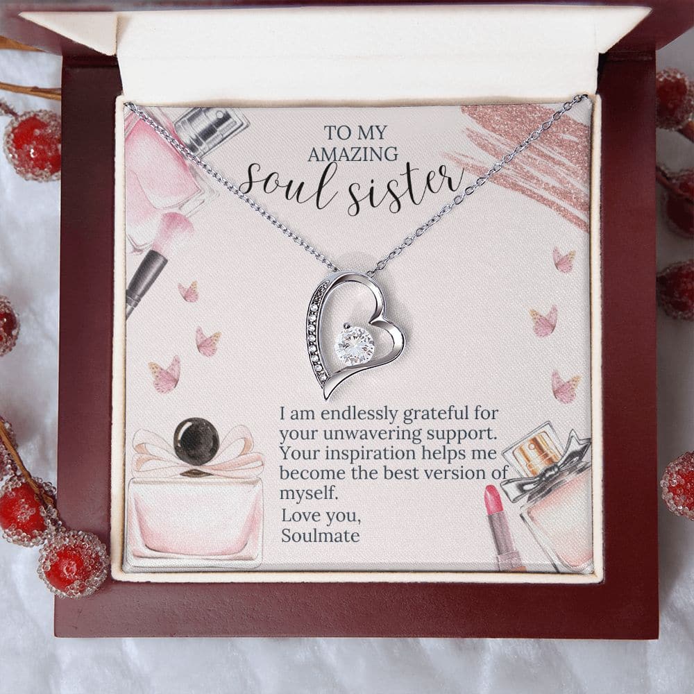 Alt text: "Soul Sister Unity Necklace Set - A heart pendant with a 6.5mm CZ crystal, encrusted with shimmering tiny crystals, in a box"