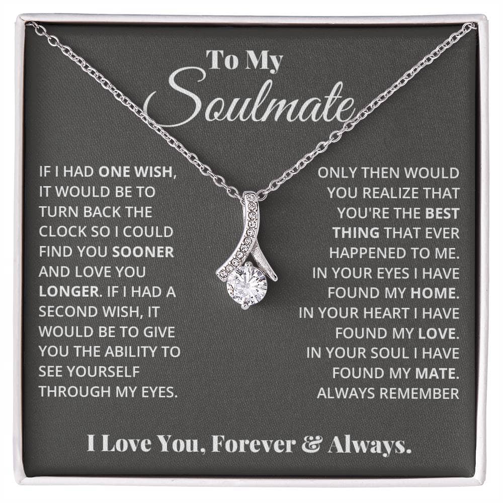 Alt text: "A personalized Soulmate Necklace in a box, featuring a diamond pendant symbolizing intertwined destinies and devotion. Available in 14k white or 18k gold finishes. Perfect for everyday wear or special occasions."