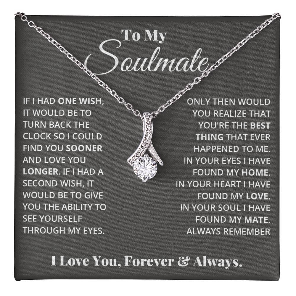 Alt text: "Close-up of a diamond pendant necklace, symbolizing love and commitment. Available in white or gold finishes. Perfect for everyday wear or special occasions."