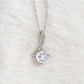 Alt text: "Close-up of a personalized Soulmate Necklace with diamond pendant on a chain"