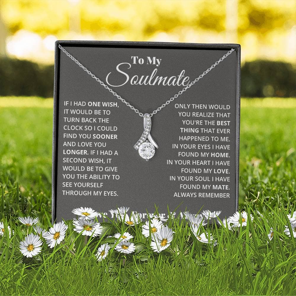 Alt text: "Personalized Soulmate Necklace in a box with flowers, symbolizing everlasting love and commitment"