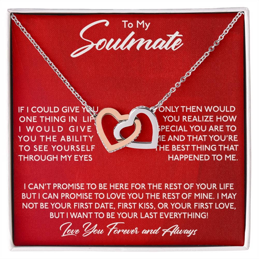 A necklace in a box, featuring interlocking hearts or love knots design, crafted with 14k white gold or 18k gold finish, adorned with cushion-cut cubic zirconia. Presented in a luxurious mahogany-style box with LED lighting. Perfect symbol of commitment and passion.