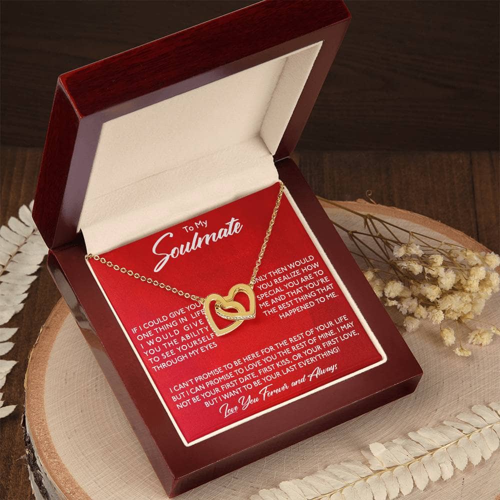 A personalized Soulmate Necklace with interlocking hearts, elegantly presented in a mahogany-style box with LED lighting.