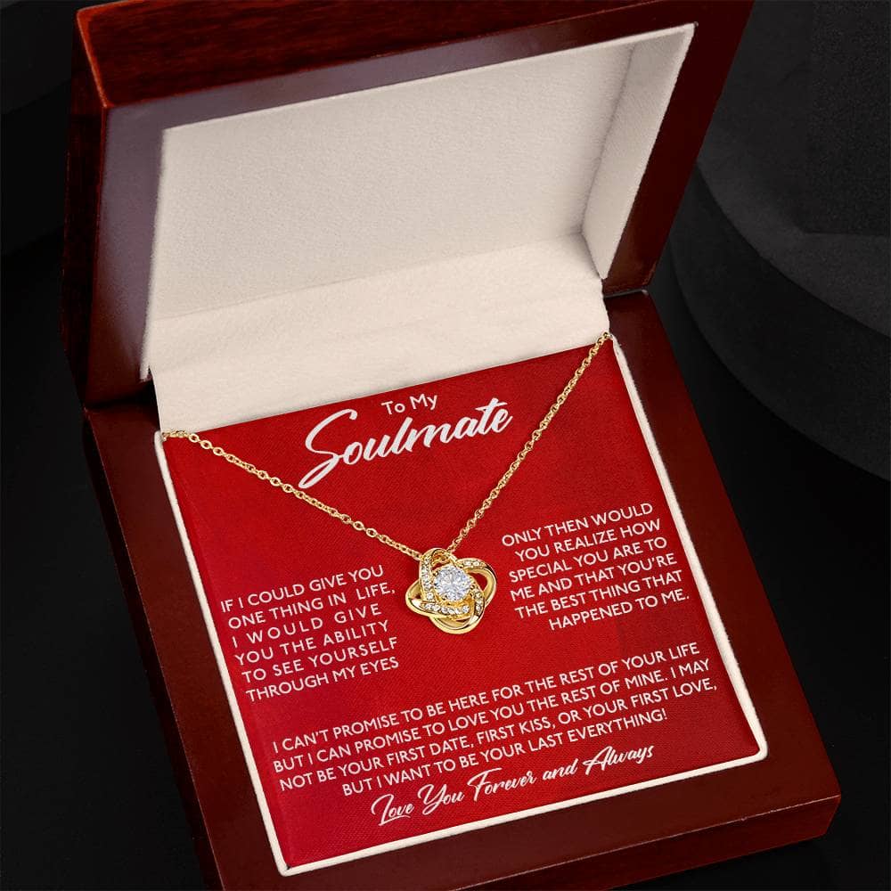 A close-up of the Special Soulmate Love Knot Necklace, a symbol of eternal love. Crafted with 14k white or 18k gold, adorned with stunning cubic zirconia stones. Presented in a luxurious mahogany-styled box with LED lighting. Perfect for any occasion, this necklace is a testament to a special bond.
