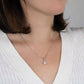 Alt text: "Woman wearing a personalized Soulmate Necklace with cushion-cut cubic zirconia pendant on adjustable chain."