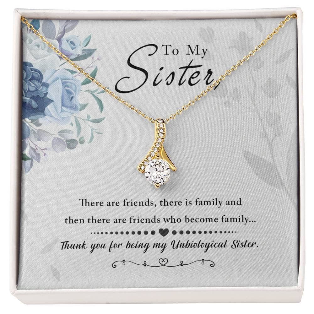 To My Sister, Thank You For Everything - Alluring Beauty Necklace: A close-up of a dazzling diamond pendant in a ribbon shape, nestled in a box.