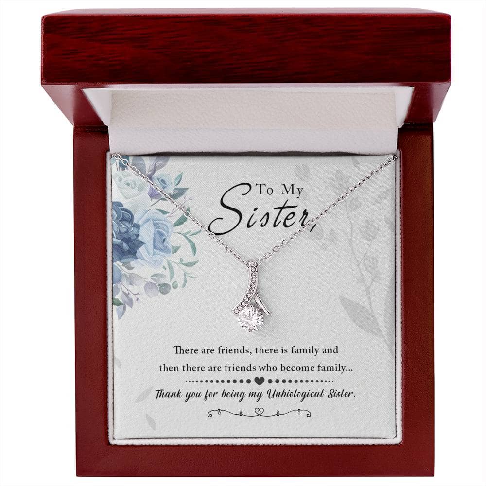 To My Sister, Thank You For Everything - Alluring Beauty Necklace: A stunning gift with a petite ribbon-shaped pendant. 14k white gold or 18k yellow gold finish over stainless steel. Features a 7mm cubic zirconia. Pendant dimensions: 0.8" (20mm) height / 0.4" (10mm) width. Adjustable length: 18" - 22" (45.72 cm - 55.88 cm). Lobster clasp. Packaged in a soft touch box for easy gifting. Upgrade to the mahogany style luxury box with LED spotlight.