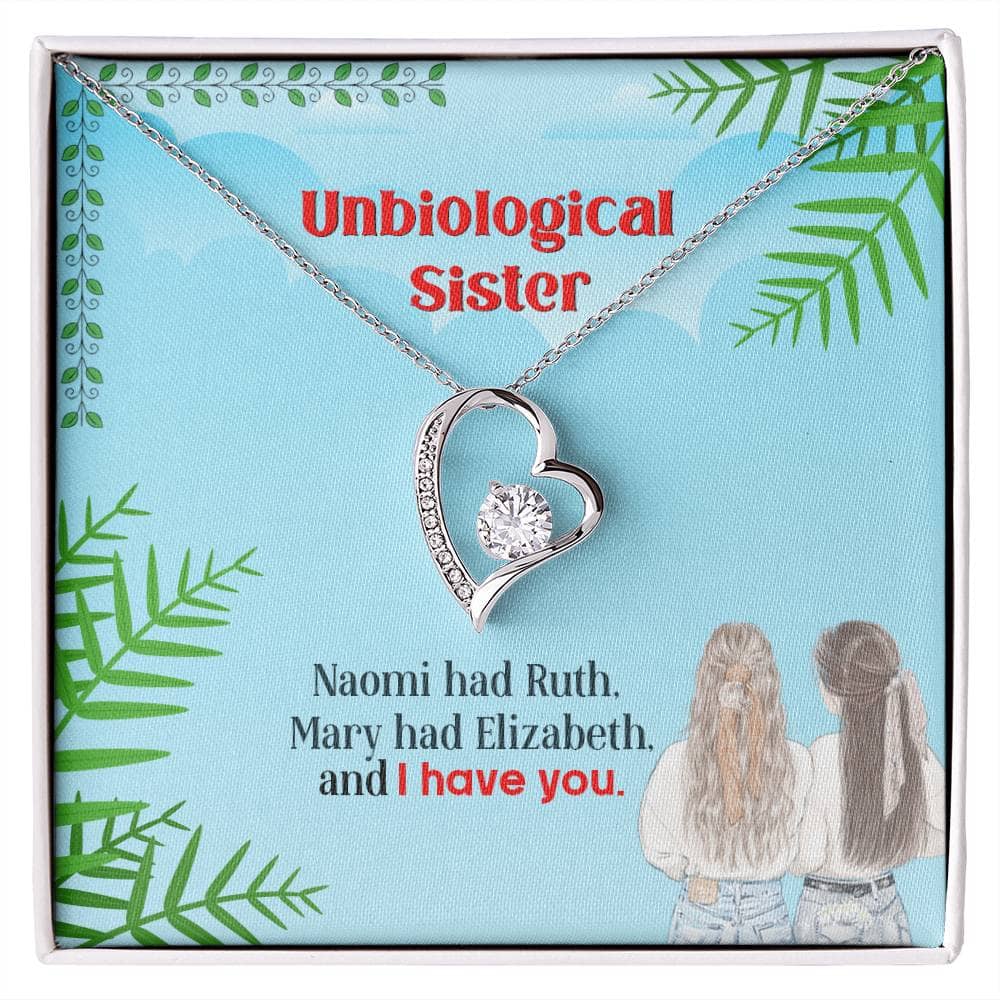 Alt text: "Unbiological Sister Custom Friendship Necklace in a box, featuring a heart-shaped diamond pendant and interlocking hearts design, symbolizing the everlasting bond between sisters."