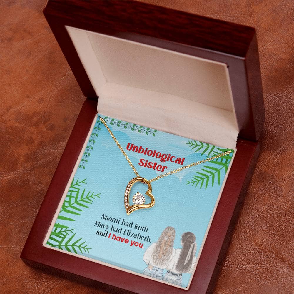 Alt text: "Unbiological Sister Custom Friendship Necklace in box with interlocking heart pendant and LED lighting"