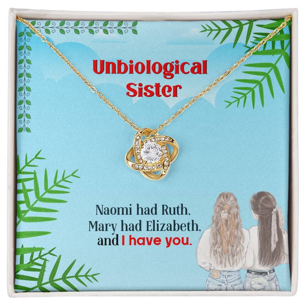 Alt text: "Unbiological Sister Personalized Love Knot Necklace - A gold necklace with a diamond pendant in a chic mahogany-style box with LED lighting."