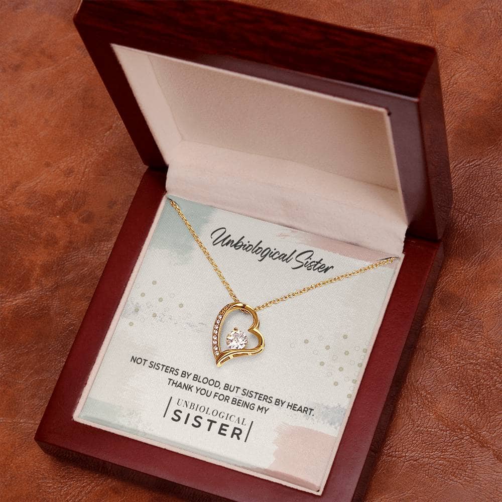 Alt text: "Unbiological Sister Tribute: Personalized Forever Love Necklace in a box with gold heart pendant and LED lighting"